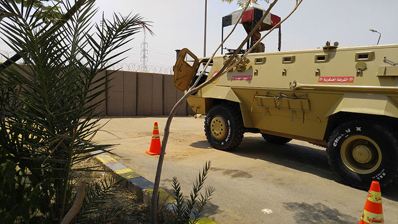 Defensive barrier 4 vehicles protected by hesco defensive barrier