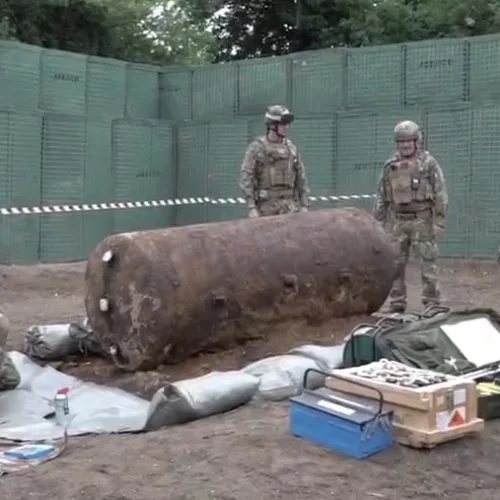 NATO forces, protected by JOESCO hesco barriers, cleared unexploded bombs from WWII.